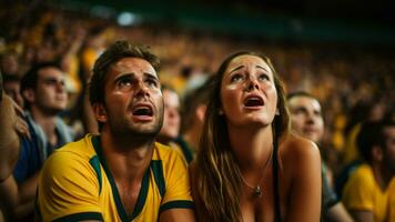 Sad Brazilian soccer fans photo