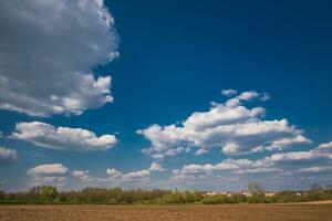 blue sky background with white striped clouds in heaven and infinity may use for sky replacement photo