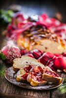 Christmas Cake and Christmas Decorations. Christmas cake, slovak or eastern europe traditional pastry - vianocka photo