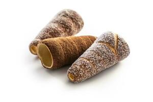 Vanilla coconuct and cinnamon trdelnik isolated on white background photo