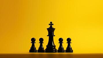 Black chess piece with king s silhouette on yellow backdrop photo