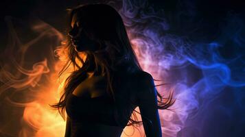 A stunning female silhouette with long hair illuminated by a flash in the dark is portrayed in both full face and profile with a smoky background photo