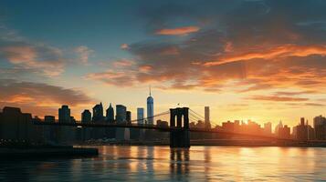 Early morning panorama of the New York City skyline with the Brooklyn Bridge silhouetted photo