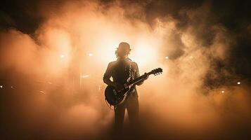 Retro style photo of guitarist s silhouette surrounded by smoke in concert