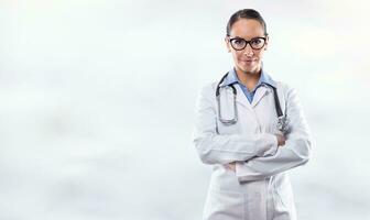 Female doctor standing in front of a blurred panoramic background photo