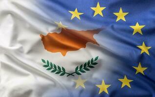 Flags of Cyprus and EU blowing in the wind photo