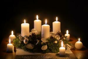 Advent wreath with burning candles christmas balls and decorations photo