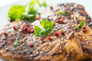 Grilled Chicken Breast with peppercorn parsley and seasame seeds photo