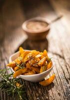 Potatoes. Roasted american potatoes with rosemary salt and cumin photo