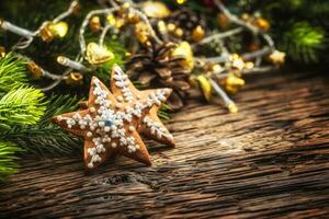 Christmas cake ginderbread. Christmas stars cakes and decoration on rustic oak table photo