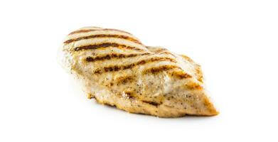 Chicken breast grilled with salt pepper isolated on white background. photo