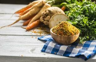 Seasoning spices condiment vegeta from dehydrated carrot parsley celery parsnips and salt with or without glutamate photo