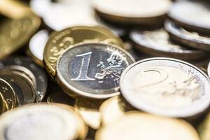 Close-up a pile of new euro coins in other compositions photo