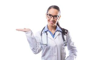 Portrait of a young beautiful woman doctor isolated on white photo