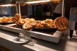 Various pastries on the buffet table in the hotel restaurant photo