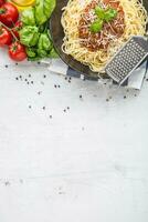 Spaghetti Bolognese. Pasta spaghetti Bolognese with basil and decoration in restaurant or home photo