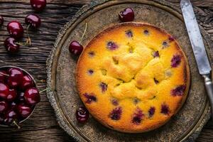 Cherry Cake. Assortment ingredients and cherry cake in retro style. photo