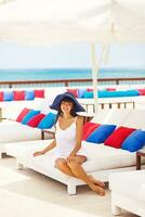 Woman enjoying a relaxing resort photo