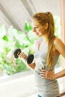 Young woman working out photo