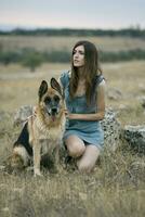 Woman qith a dog photo