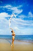 Beautiful woman on the beach photo