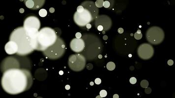 White circles bokeh particles abstract background on black background. Futuristic glittering in space. video