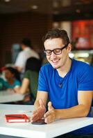 Man at a coffee shop photo