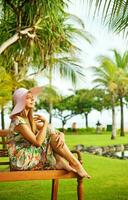 Beautiful woman relaxing on the garden photo