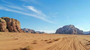 With camel caravan through the deserts of Wadi Rum, Jordan photo