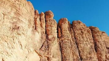 With camel caravan through the deserts of Wadi Rum, Jordan photo