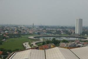 View of tall buildings, seen from the rooftop. photo