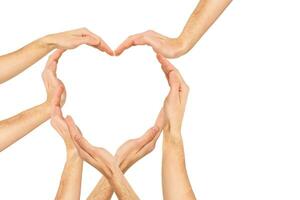 Hands make heart shape on a white background photo