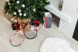 Christmas New year concept with tennis racket. top view, flat lay, close up. fitness, sport, game and health objects as lifestyle concept. photo