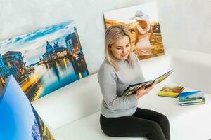 woman in studio with photo canvas