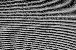 Original beautiful background in black and white with lines formed on the sand from the beach photo