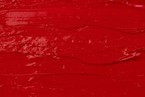 Abstract acrylic red paint texture background photo