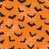 Flying bats seamless pattern on orange sky background vector