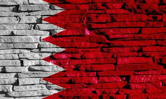 Flag of Kingdom of Bahrain on a textured background. Concept collage. photo