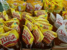 photo of cooking oil packaging in a cardboard box in supermarket. Bandung-Indonesia July 31 2023