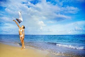 Beautiful woman on the beach photo