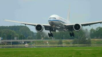 AMSTERDAM, THE NETHERLANDS JULY 27, 2017 - Air China Cargo Boeing 777 B 2092, landing on runway 18R Polderbaan. Shiphol Airport, Amsterdam, Holland video