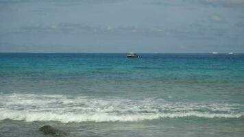 Turquoise waves rolled on the rocks, beach of Koh Miang island, Similan Islands video