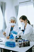 Scientist team meeting and writing analysis results in the laboratory study and analyze scientific sample for global warming, analytics and tech. photo