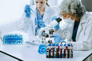 Scientist two woman with tablet and laptop, laboratory and ecofriendly science. Agriculture, research and scientists with online reading, test samples for global warming analytics and tech. photo