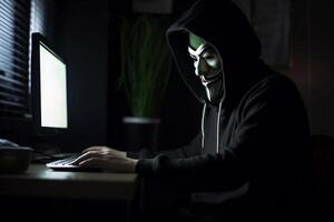 Anonymous hacker with hood and mask sitting next to computer generative ai photo