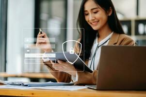 Cyber security concept, Login, User, identification information security and encryption, secure access to user's personal information woman using smart phone and tablet photo