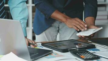 Financial Business team present. Business man hands hold documents with financial statistic stock photo, discussion, and analysis report data the charts and graphs. Finance Financial concept video