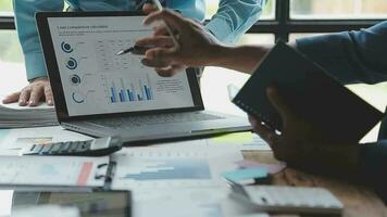 Financial Business team present. Business man hands hold documents with financial statistic stock photo, discussion, and analysis report data the charts and graphs. Finance Financial concept video