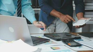 Financial Business team present. Business man hands hold documents with financial statistic stock photo, discussion, and analysis report data the charts and graphs. Finance Financial concept video