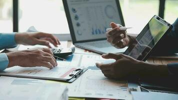 Financial Business team present. Business man hands hold documents with financial statistic stock photo, discussion, and analysis report data the charts and graphs. Finance Financial concept video
